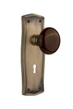 Nostalgic Warehouse 718717 - Nostalgic Warehouse Prairie Plate with Keyhole Privacy Brown Porcelain Door Knob in Antique Brass