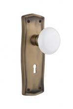 Nostalgic Warehouse 718844 - Nostalgic Warehouse Prairie Plate with Keyhole Privacy White Porcelain Door Knob in Antique Brass