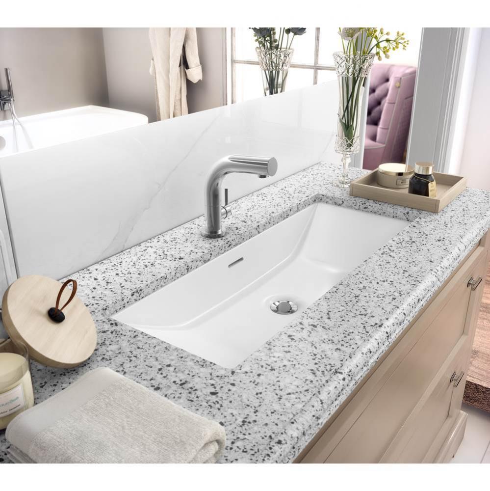 Low level single hole basin mixer. Polished
