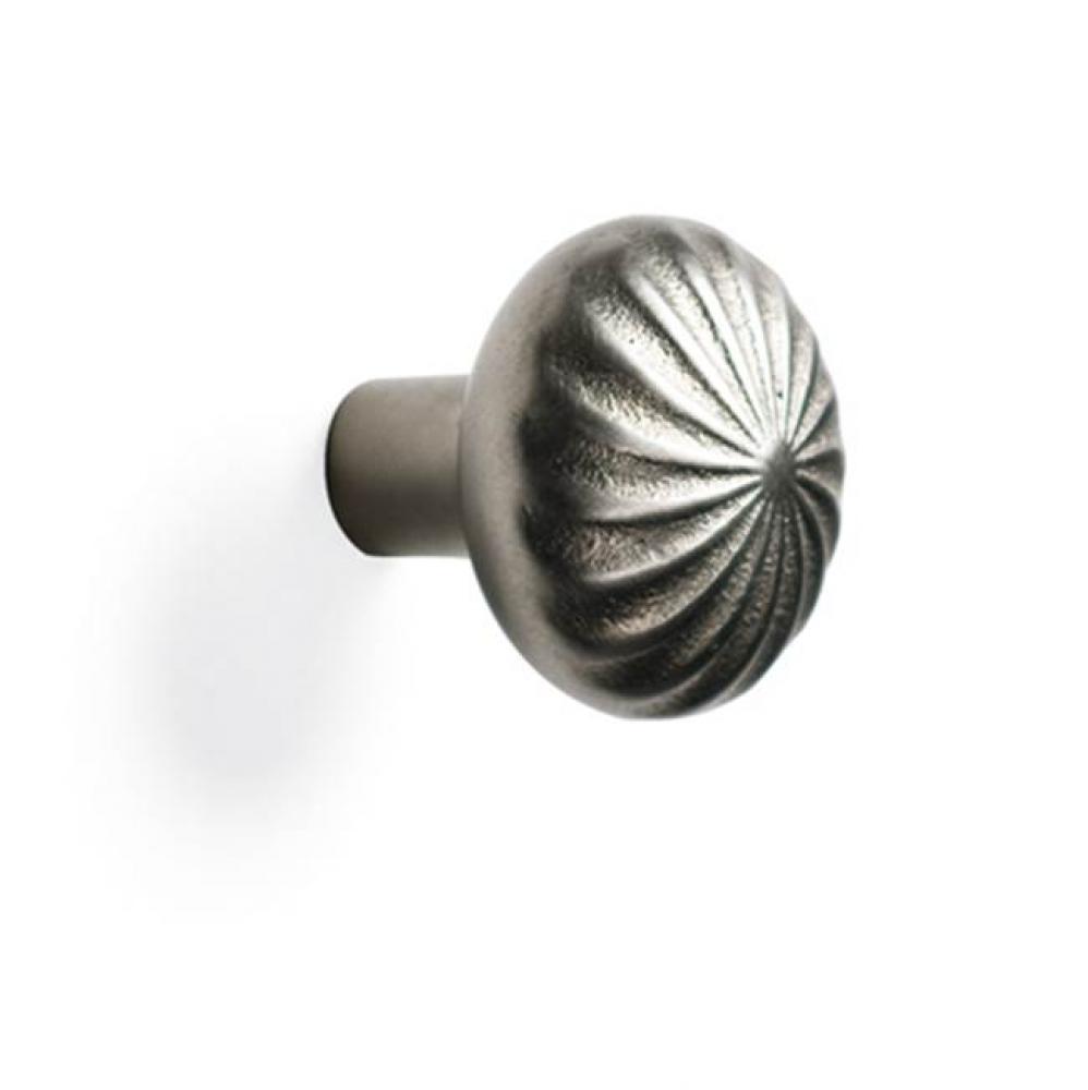 1 3/8'' Giro round cabinet knob.