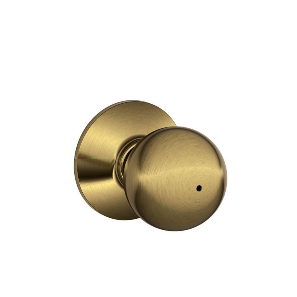 Orbit Knob Bed and Bath Lock in Antique Brass