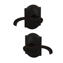 Schlage FC172 WIT 716 CAM - Custom Whitney Non-Turning Lever with Camelot Trim in Aged Bronze
