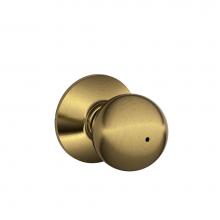 Schlage F40 ORB 609 - Orbit Knob Bed and Bath Lock in Antique Brass