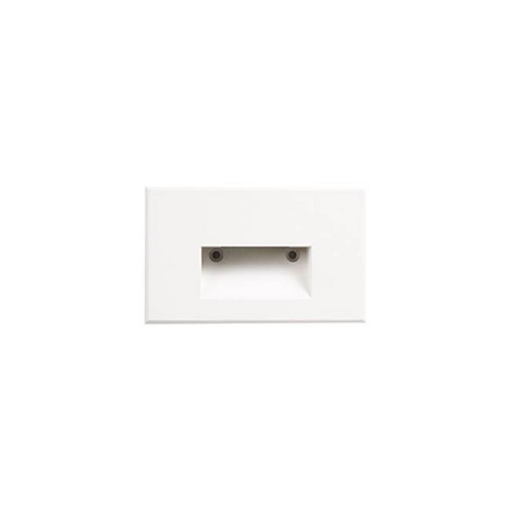 A Vertical Rectangle-Shaped Recessed Light In Matte Black Or White Powder Coat. The Optically