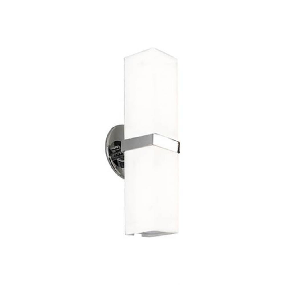 A Rectangular Tube Of White Opal Glass Is Attached To The Wall With A Delicate, Square Metal